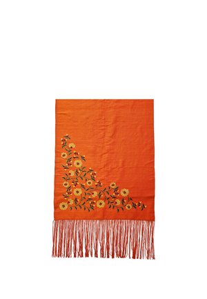 Orange textile with yellow and green floral embroidery in corner and long orange fringe along one edge.