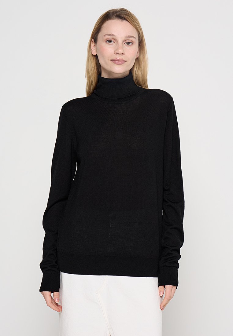 Schwarzer Rollkragenpullover aus dünnem, weichem Strickmaterial. Mit langen Ärmeln und gerippten Bündchen. Schlichtes Design ohne sichtbare Muster.
