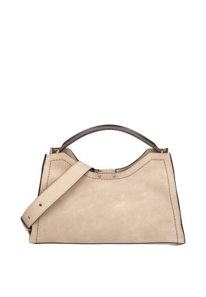 Beige suede handbag with wide adjustable strap, short dark handle, gold rivet details, and stitched edges on a white background.