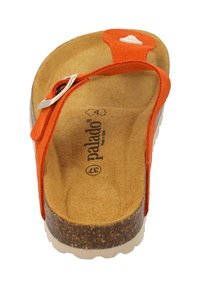 Orange suede sandal with cork footbed, adjustable strap, and white accent. Features a textured sole and embossed brand logo.