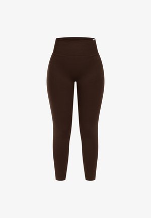 Leggings marroni a vita alta realizzati in materiale elasticizzato, con una texture liscia e un design aderenza, senza motivi o accessori visibili.