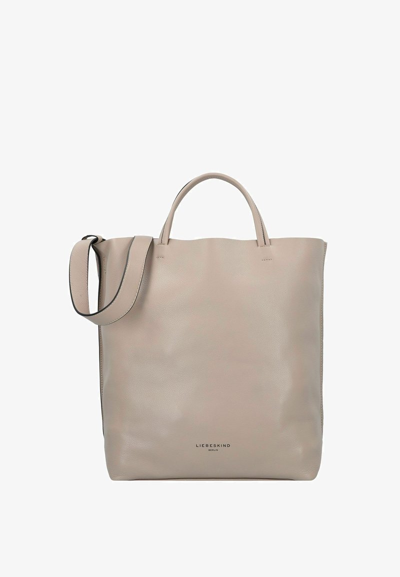 Sac en cuir beige avec deux poignées supérieure et une bandoulière amovible, présentant une texture lisse et un design minimaliste.
