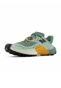 Green athletic shoe with a mesh upper, orange accents, a textured midsole, and a rugged black outsole for traction. Features a fitted tongue.