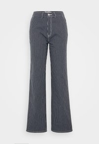 Pantalon large à rayures bleues et blanches, taille haute, fermeture par boutons et poches latérales. Tissu lisse avec un motif classique.