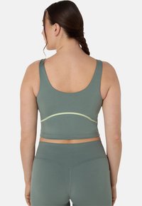 ASICS NAGINO FLEX - Reggiseno sportivo con sostegno medio - monument blue
