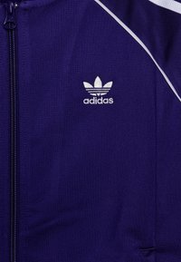 adidas Originals TRACK UNISEX - Mikina so zipsom - collegiate purple