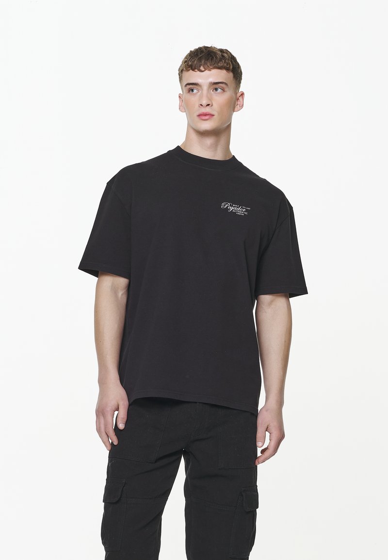Tavery Pegador TAVERY OVERSIZED TEE - T-shirts print - vintage onyx black/sort ...