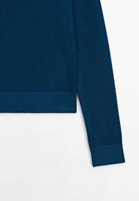 Long-sleeve navy blue knit sweater sleeve and hem with ribbed cuffs and waistband on a white background.