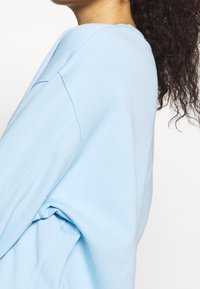 Weekday Mikina - light blue