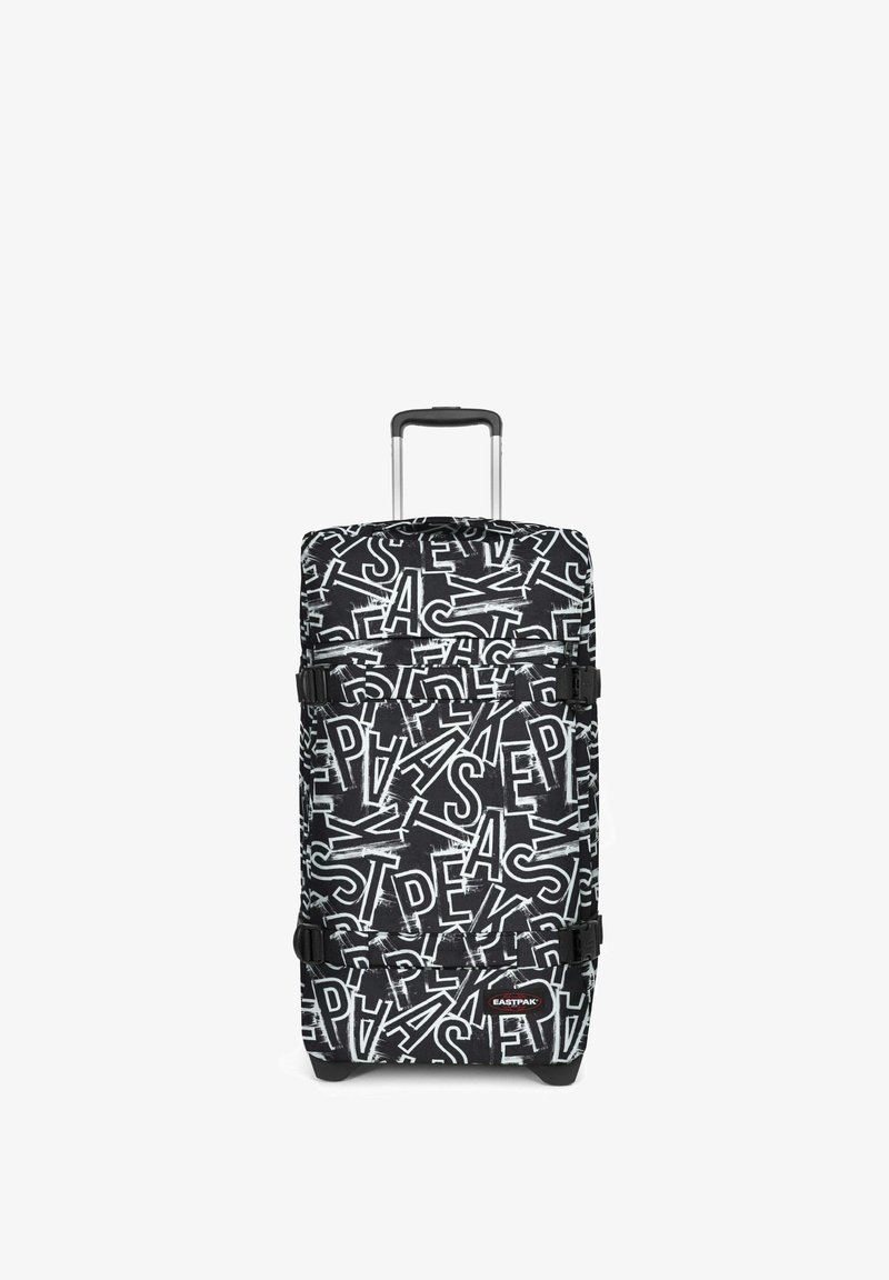 Valise rigide noire et blanche avec un motif abstrait de logo Eastpak, poignée télescopique et deux sangles latérales réglables.
