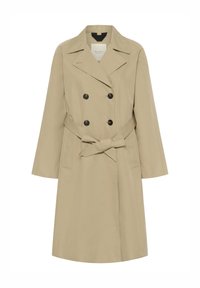 Trench-coat beige à double boutonnage avec des boutons noirs, de larges revers, des poches latérales et une ceinture en tissu nouée à la taille.