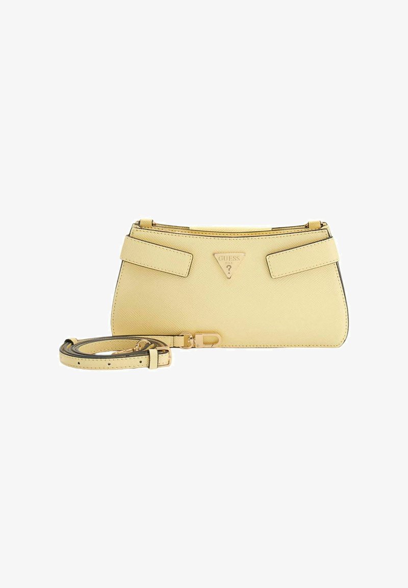 Sac à main en similicuir jaune avec un logo triangulaire, fermeture éclair et bandoulière amovible. Texture lisse, design structuré et quincaillerie minimale.