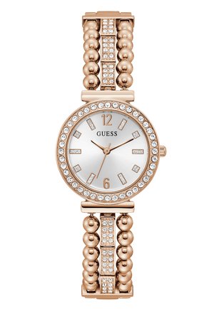 Orologio in oro rosa con un quadrante rotondo, fondo argentato, dettagli in cristallo e un bracciale con texture a perline che presenta maglie rettangolari e ulteriori dettagli in cristallo.