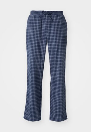 Marineblauwe pyjamabroek met een ruitpatroon, voorzien van een elastische tailleband en koord, gemaakt van een zachte stof voor comfort.
