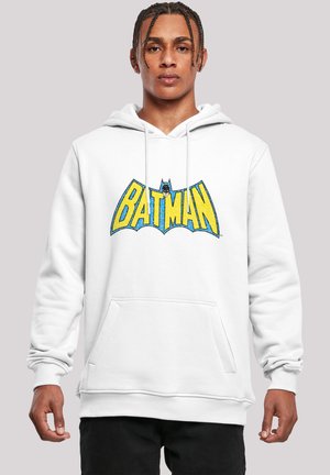 Hvit hettegenser med en stor gul "BATMAN" logo med blå detaljer. Har en frontlomme og ribbestrikkede mansjetter og hem. Lett stoff.