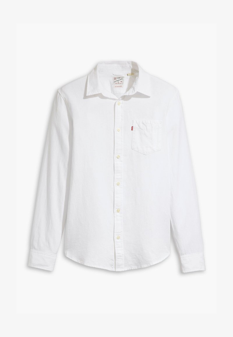 Camicia bianca a maniche lunghe con bottoni, realizzata in cotone. Presenta un colletto, una tasca sul petto e bottoni gialli; texture liscia e vestibilità sartoriale.