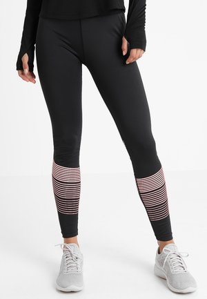 Black athletic leggings with horizontal pink and white stripes at the calves. Smooth fabric, fitted design, no visible fastenings.