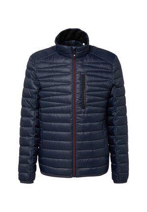 Giacca imbottita blu navy con motivo trapuntato verticale, chiusura con zip, colletto alto e una tasca con zip sul petto. Il tessuto è liscio e lucido.