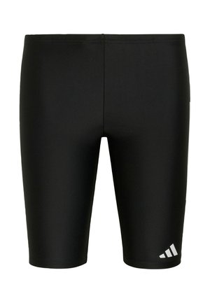 Černé těsné plavkové šortky do kolen s malým bílým logem Adidas na spodní levé noze.