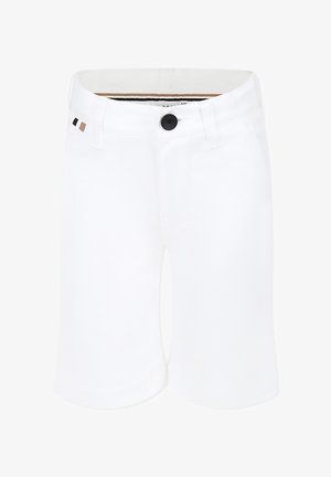 Shorts bianchi con una texture liscia, dotati di un bottone nero, due piccole toppe decorative in nero e marrone, e tasche frontali.