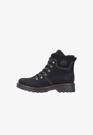 Zwarte leren wandelschoenen met metalen bevestigingen, doorlopende veters, een gevoerd kraagje en een gestructureerde zool. Bevat een cirkelvormig logo op de enkel.