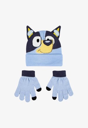 Child's blue knit hat with cartoon dog face and ears, paired with matching blue gloves with black fingertips and cuffs.