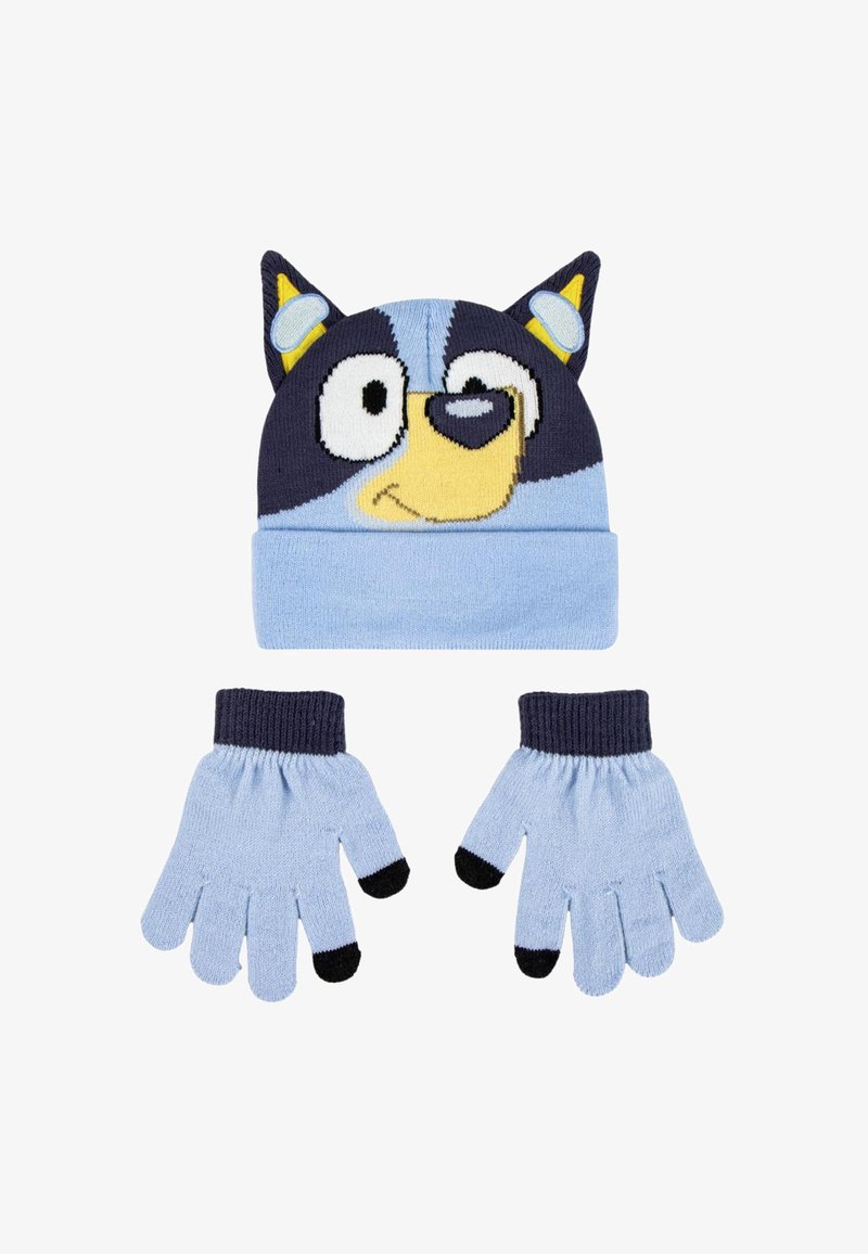 Blauwe gebreide muts voor kinderen met een cartoonhondengezicht en oren, gecombineerd met bijpassende blauwe handschoenen met zwarte vingertoppen en manchetten.