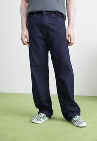 Carhartt WIP LANDON PANT - Relaxed fit -farkut - blue rinsed
