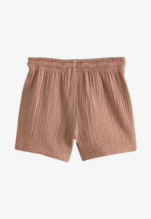 Blandning av bomullsshorts i mjuk rosafärg med krinklad struktur, elastisk midja och fållade kanter, designade för komfort och enkelhet.