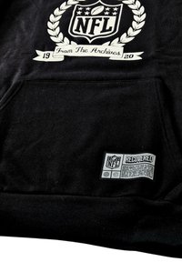 Black hoodie featuring a white NFL logo and text design, textured fabric with a front pocket, and a “Recovered” label on the hem.