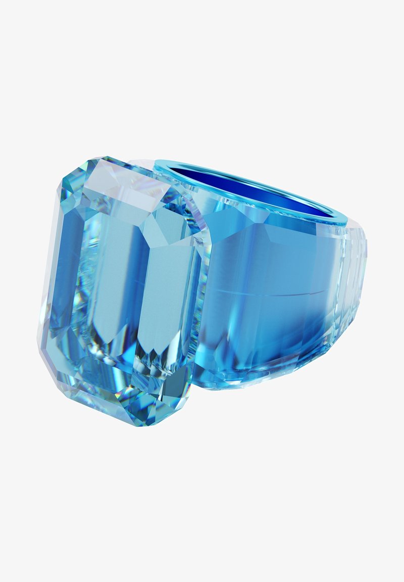 Bague en cristal bleu présentant une grande pierre octogonale aux surfaces facettées, montée sur une bande lisse avec un intérieur bleu brillant.