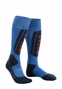 Calze blu fino al ginocchio con accenti neri, caratterizzate da un motivo testurizzato e la scritta "FALKE" stampata in rosso. Realizzate in un materiale elastico per il massimo comfort.
