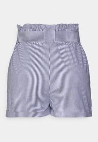 Blue and white striped shorts with a ruffled waistband, featuring pleated front details and rolled hems for added texture.
