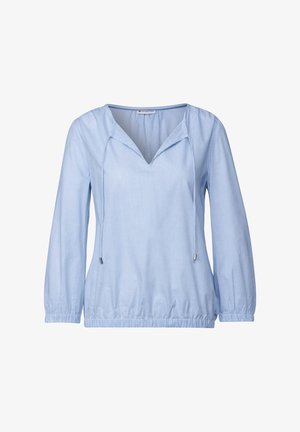 Vaaleansininen neulepaita, jossa on V-pääntie, pitkät hihat, elastinen helma ja säädettävät nyörit kaula-aukon ympärillä. Raidallinen kangas.