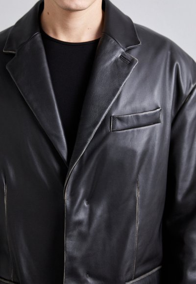 032c ORION COAT - Klassischer Mantel - black