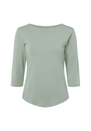 Light green, long-sleeve top made of soft, stretchy material with a round neckline and curved hem design for a relaxed fit.