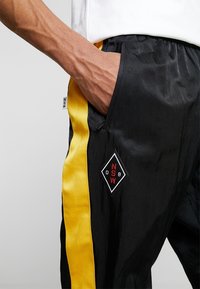 Nike Sportswear Trainingsbroek - black