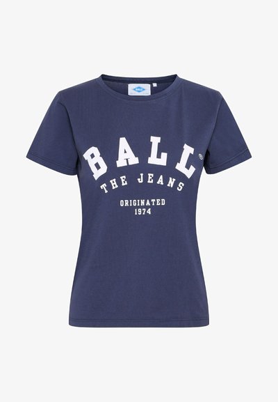 Námořnická modrá bavlněná tričko s bílým textem: "BALÍK DŽÍNŮ ORIGINÁL 1974." Krátké rukávy a design s kulatým výstřihem.