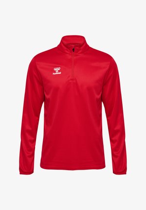 Rotes Langarmoberteil mit hohem Kragen und Viertel-Reißverschluss. Hergestellt aus glattem Stoff mit einem subtilen Glanz. Hummel-Logo auf der Brust platziert.