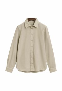 Beige långärmad skjorta med knappar och spetsig krage, framfick och något rundad sämske. Tillverkad av ett slätt, texturerat tyg.