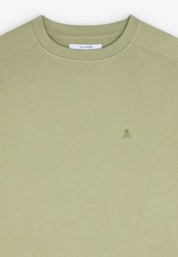 Lys grøn crewneck sweatshirt lavet af tekstureret stof. Har et lille grønt logo på brystet. Ingen synlige mønstre eller accenter.