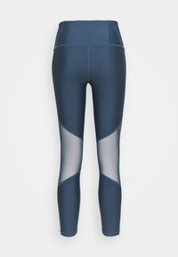 Granatowe legginsy sportowe z wysokim stanem, siateczkowymi wycięciami oraz gładką teksturą materiału z kontrastującymi akcentami po bokach.