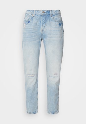 Lyseblå falmede denimjeans med høy midje, frontlås og glidelås, fem lommer, og subtile slitte og lapper detaljer.