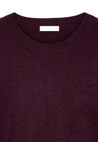 Burgundi raštuotas megztinis su apvaliu kaklu, minkšta tekstūra ir ripsu dekoracijomis. Vidinėje apykaklėje yra mažas prekės ženklo žymeklis.