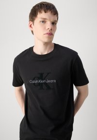 Calvin Klein Jeans MONOLOGO TEE - T-shirt print - black
