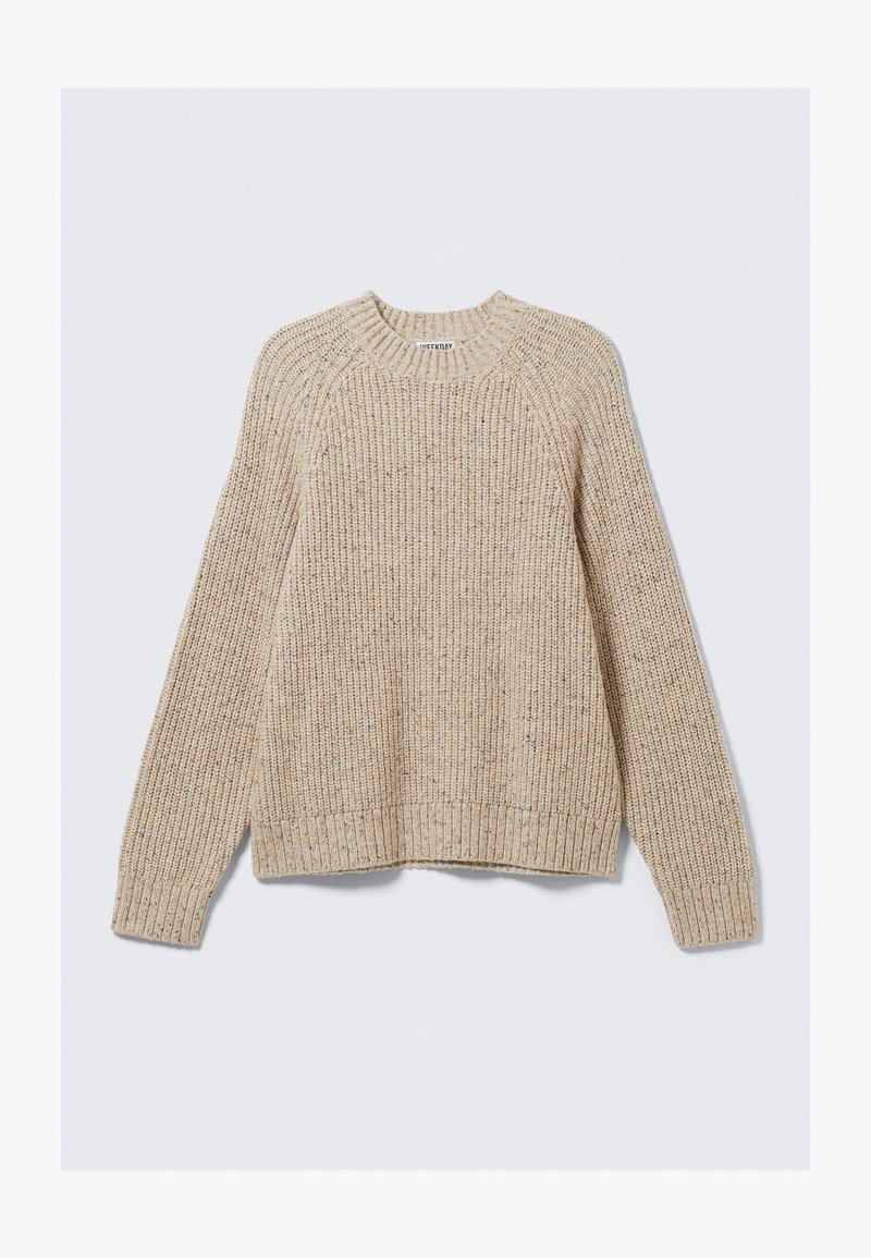 Suéter beige de canalé con cuello redondo y mangas largas. Hecho de material texturizado, presenta un corte relajado y puños acanalados.