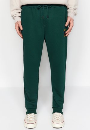 Pantalones deportivos - green