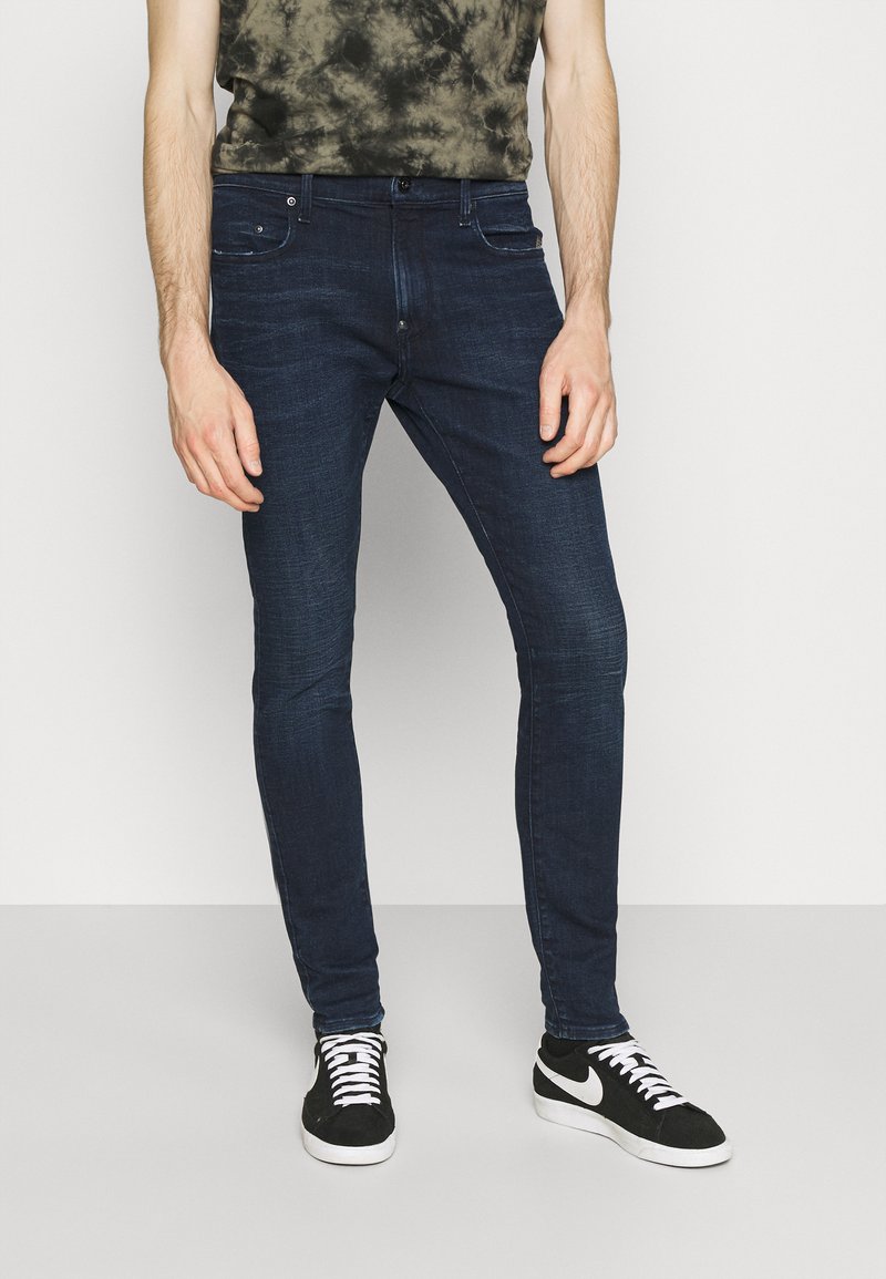 G-STAR REVEND SKINNY - Calças de ganga de corte skinny - worn in ultramarine
