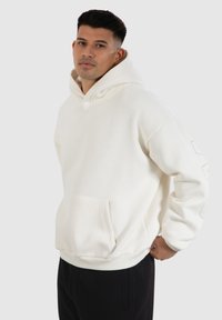 Smilodox HOLLOW BRAIL - Sweat à capuche - creme