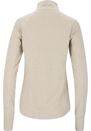 Hellbeige Langarmshirt mit hohem Kragen. Verfügt über Raglannaht und subtile Textur. "ENDURANCE"-Logo an der Rückseite des Kragens.